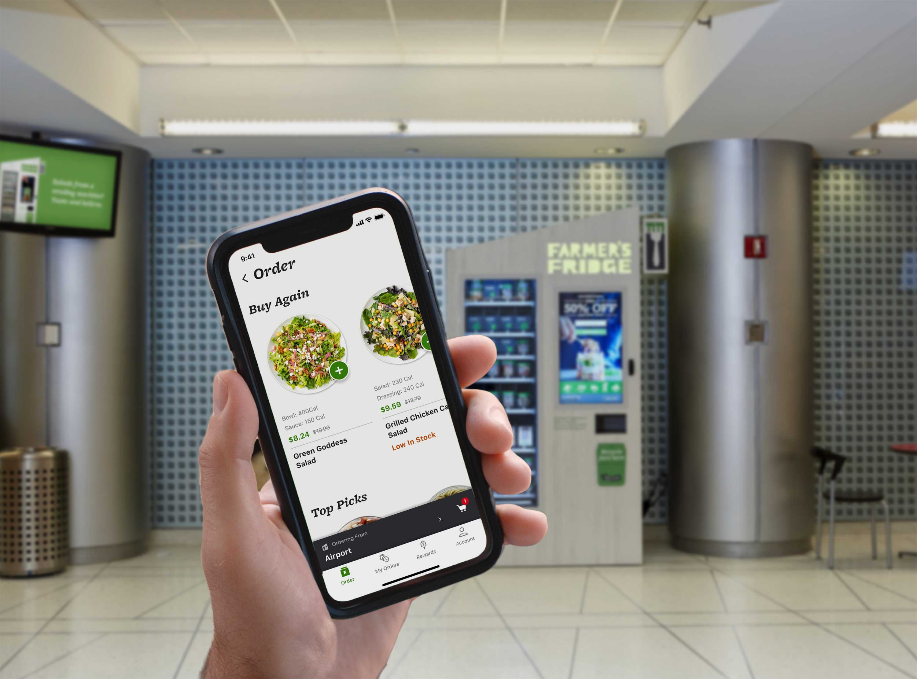 Customer using the Farmer's Fridge app on their phone